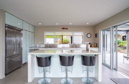 Mangawhai Heads House | Coastal Charmer - Modern holiday home with multiple covered outdoor entertaining spaces and spa