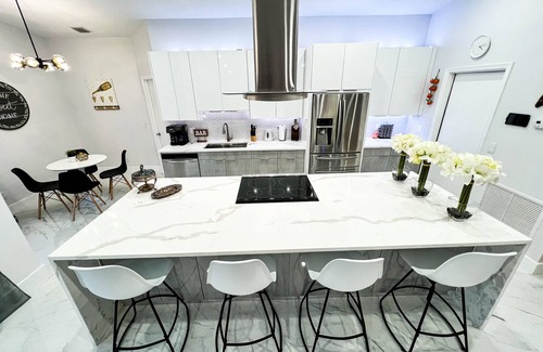 Dania Beach House | Coastal Chic Retreat:5 Min to Beach, Heated Pool, 4 BD , Near Casino & Parks!