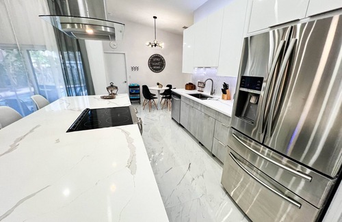 Dania Beach House | Coastal Chic Retreat:5 Min to Beach, Heated Pool, 4 BD , Near Casino & Parks!