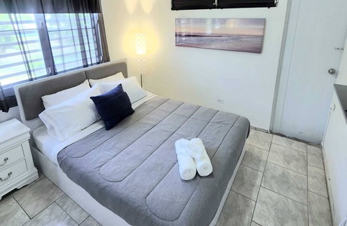 Levittown Apartment | Coastal Comforts: Shop, Dine, and Beach - All Within Reach!