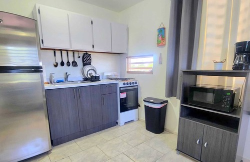 Levittown Apartment | Coastal Comforts: Shop, Dine, and Beach - All Within Reach!