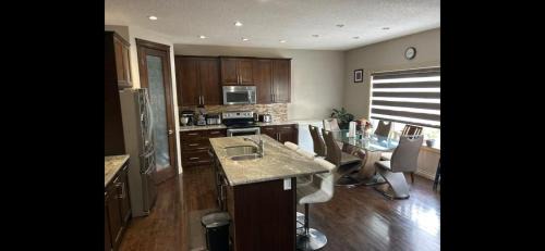 Airdrie Apartment | Coastal Comforts Villa