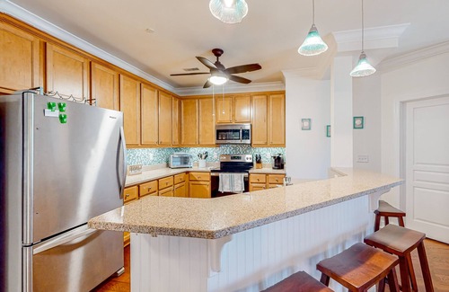Supply Condo | Coastal condo with excellent views, balcony, washer/dryer, & AC - pool access