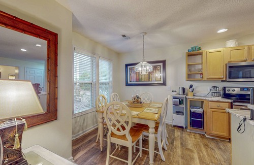 St. James Condo | Coastal Condo with golf course view and shared pool access