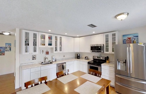 Surfcrest Village Cottage | Coastal Cottage with community pool, free parking and boardwalk to beach- SCV 12