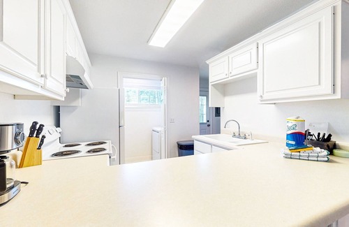 Port St. Joe House | Coastal getaway steps from the bay with patio, balcony, smart TVs, & W/D