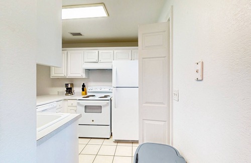 Port St. Joe House | Coastal getaway steps from the bay with patio, open layout, smart TVs, & W/D