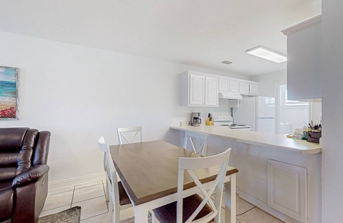 Port St. Joe House | Coastal hideaway steps from the bay with balcony, W/D, open layout, & AC