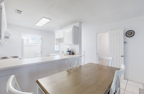 Port St. Joe House | Coastal hideaway steps from the bay with balcony, W/D, open layout, & AC