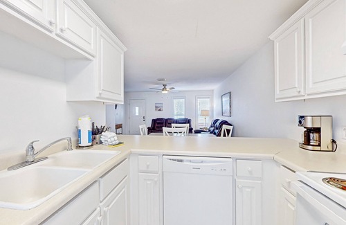 Port St. Joe House | Coastal hideaway steps from the bay with balcony, W/D, open layout, & AC