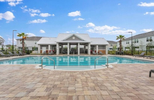 Baymeadows House | Coastal Living - Games/Pool/Volleyball