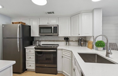 Amelia City Condo | Coastal Luxe Retreat walking distance to the Amelia Island Concours d'Elegance