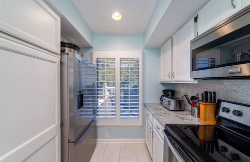 Spinnaker Beachhouses Villa | Coastal luxury at 774 Spinnaker-charming 2-BR villa in Seabrook Island, steps from beach and golf.