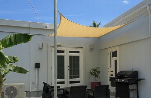 Islote House | Coastal Private Home 3 bedrooms 3 bathrooms all amenities steps away from Beach