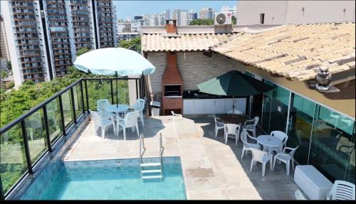 Tombo Apartment | Cobertura Luxuosa, pe na areia - Exclusividade na Praia do Tombo, Guarujá, a Mais Premiada com Bandeira Azul no Brasil