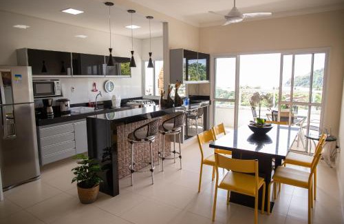 Toninhas Apartment | Cobertura Mar c/piscina particular frente pro mar