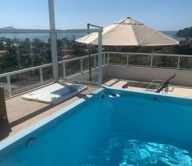 Toninhas Apartment | Cobertura Mar c/piscina particular frente pro mar