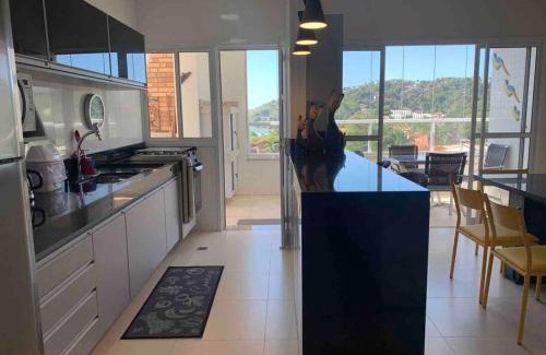 Toninhas Apartment | Cobertura Mar c/piscina particular frente pro mar