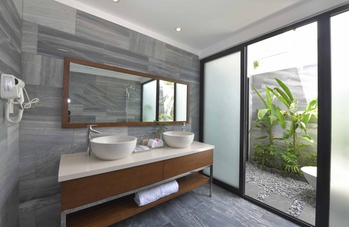 Tu Nghia Hotel | Cocoland Thu Xa Ancient Town Resort