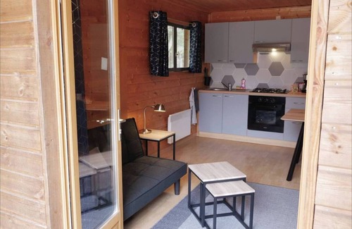 Saint-Bonnet-de-Condat Cabin | Cocooning riverside Chalet on a small campsite in the Heart of Auvergne