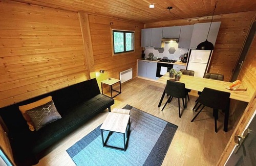 Saint-Bonnet-de-Condat Cabin | Cocooning riverside Chalet on a small campsite in the Heart of Auvergne