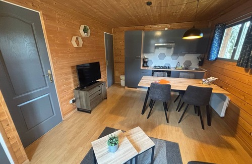 Saint-Bonnet-de-Condat Cabin | Cocooning riverside Chalet on a small campsite in the Heart of Auvergne