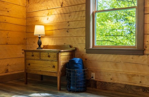Logan Cabin | Cohosh - Hand hewn private log cabin with views