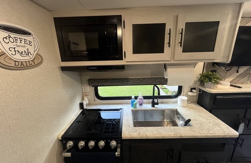 Brent House | Coleman Camper Backyard Retreat