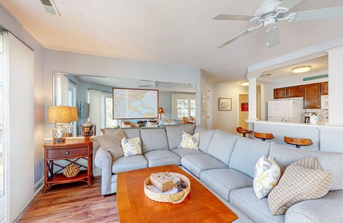 Sunset Beach Condo | Colony II at Oyster Bay condo | fast WiFi, seasonal pools, hot tub, fitness room