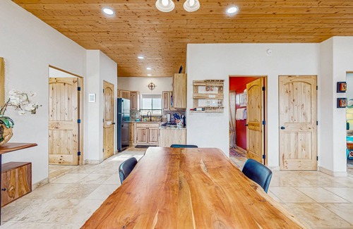 El Prado House | Colorful music-themed home with mountain views, hot tub, woodstove & WIFI