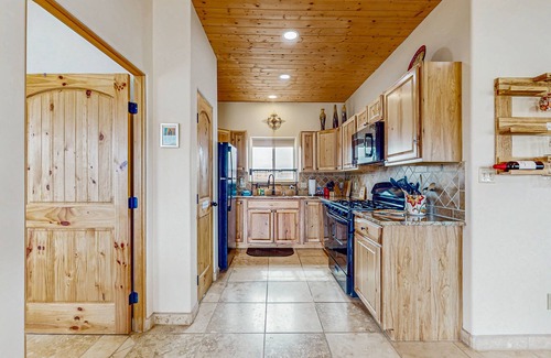 El Prado House | Colorful music-themed home with mountain views, hot tub, woodstove & WIFI