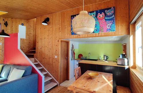 Molines-en-Queyras Cottage | Colorful, self-contained Père Castor apartment in the center of Molines
