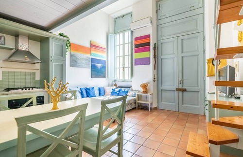 Calambrone Apartment | Colors House On The Beach by Pleiades Home