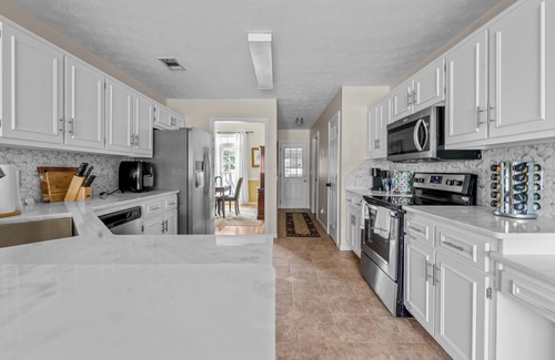 Fortson House | Columbus Gateway Home – 4BR Stay w/Hot Tub & Private Yard
