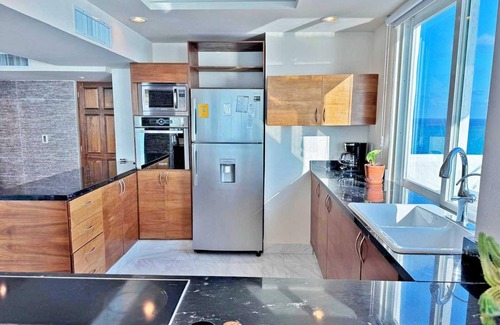 Zona Hotelera Condo | Combo #334-Tim’s Ocean Condos – Beachfront – 8br/7.5bth Hot Tub on Terrace!