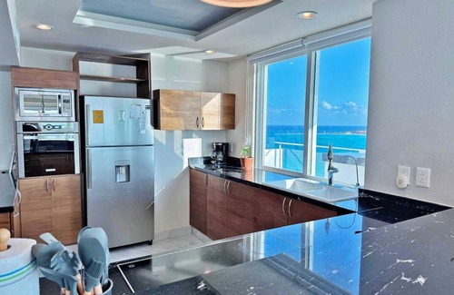 Zona Hotelera Condo | Combo #334-Tim’s Ocean Condos – Beachfront – 8br/7.5bth Hot Tub on Terrace!