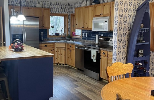 Danbury House | Come enjoy the best Wisconsin has to offer! Hot tub, sauna, pool, and new decor!