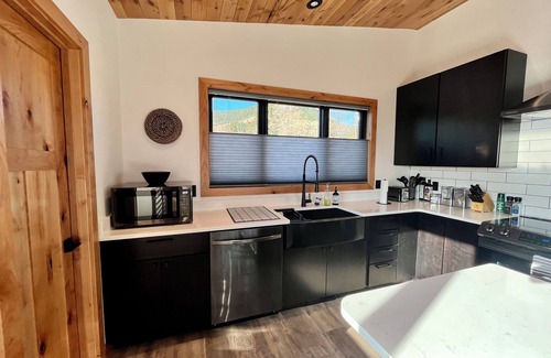 Helena House | Come feel at home at "The Roost." This custom new home is close to everything.