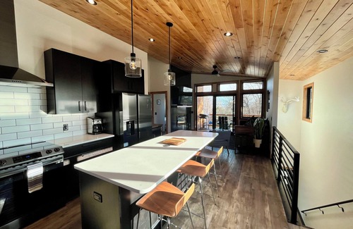 Helena House | Come feel at home at "The Roost." This custom new home is close to everything.