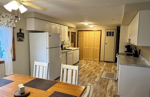 Wilbur House | Come for the Sun, Stay for the Fun in this charming 3 Bedroom Porch Home