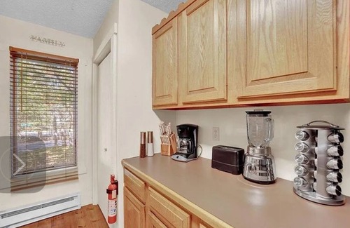 White Haven House | Come relax by the fireplace and enjoy skiing or a walk in the forest by the lake