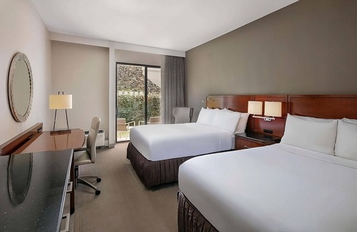 Executive Park Hotel | Comfort and Convenience! 3 Convenient Units, Pet-Friendly, Parking, Pools!