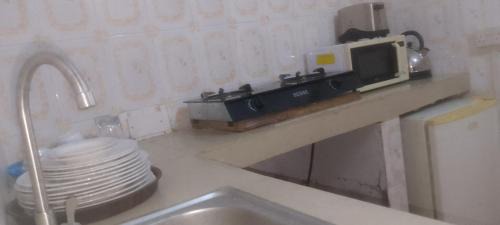 Freetown House | Comfort Zone Furnished Apartments