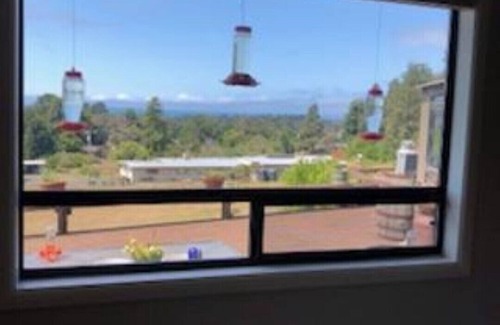 Cleone House | Comfortable 4 BR - 3 BA with large deck and distant peaceful ocean view