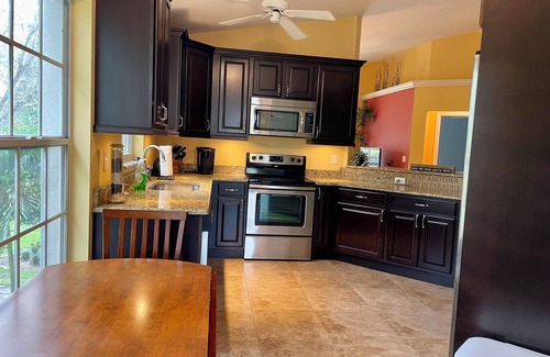 Village Walk Condo | Comfortable and Convenient condo with Laundry & a pool