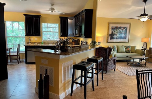 Village Walk Condo | Comfortable and Convenient condo with Laundry & a pool