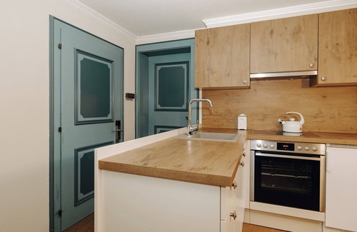 Alpendorf Apartment | Comfortable and lovingly furnished apartment with a sunny balcony.