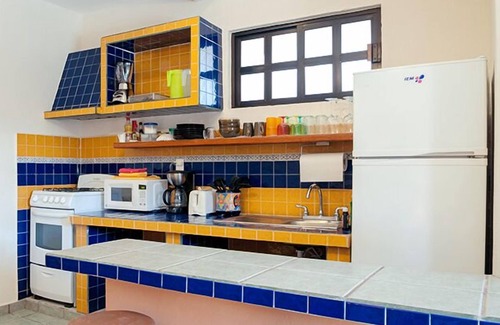 Puerto Morelos Apartment | Comfortable apartment, well equipped kitchen next to sparkling pool