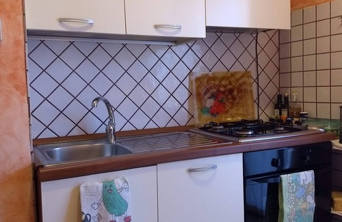 Porto Torres Apartment | COMFORTABLE APARTMENT WITH GARDEN, WI-FI NETFLIX IUN R8636