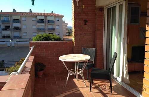 Comarruga Apartment | Comfortable apartment, Wi-Fi A/C and pool.